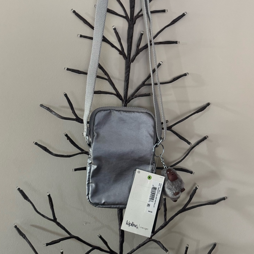Brand new”Kipling”mini crossbody bag.Size-w5”x7”inc.Color-smooth silver metallic - Picture 3 of 7